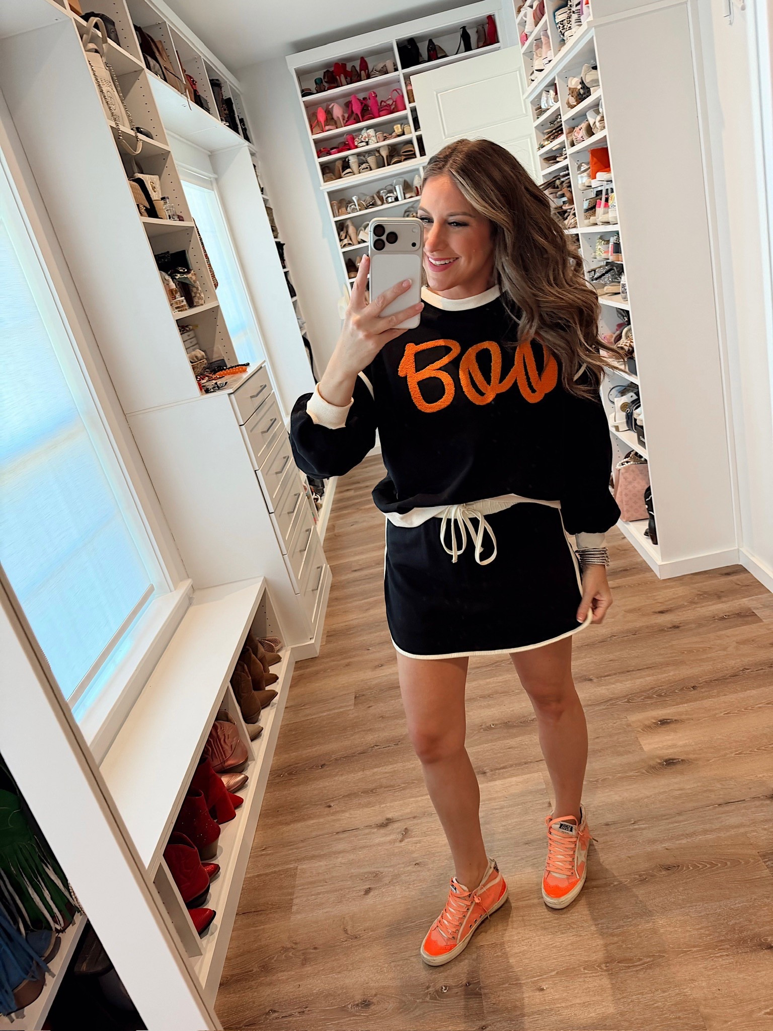 In a medium set with boo sweatshirt and skort, sneakers and accessories- fits tts.

#LTKStyleTip #LTKSeasonal #LTKHoliday