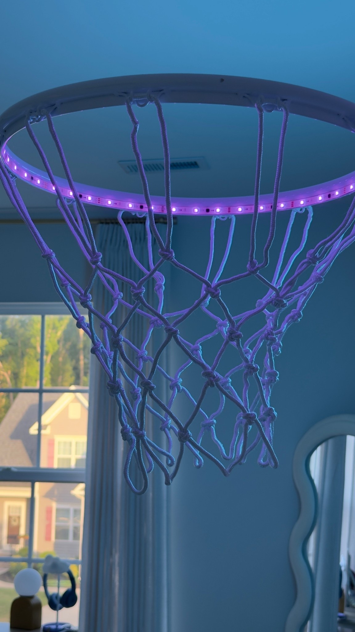 This LED-lit basketball hoop is the perfect statement piece for a kid’s or teen’s room. It adds a fun, sporty touch while doubling as décor - the glow makes the space feel modern and playful. Perfect for any basketball lover who wants their personality to shine through in their bedroom design.

#LTKHome #LTKU #LTKKids