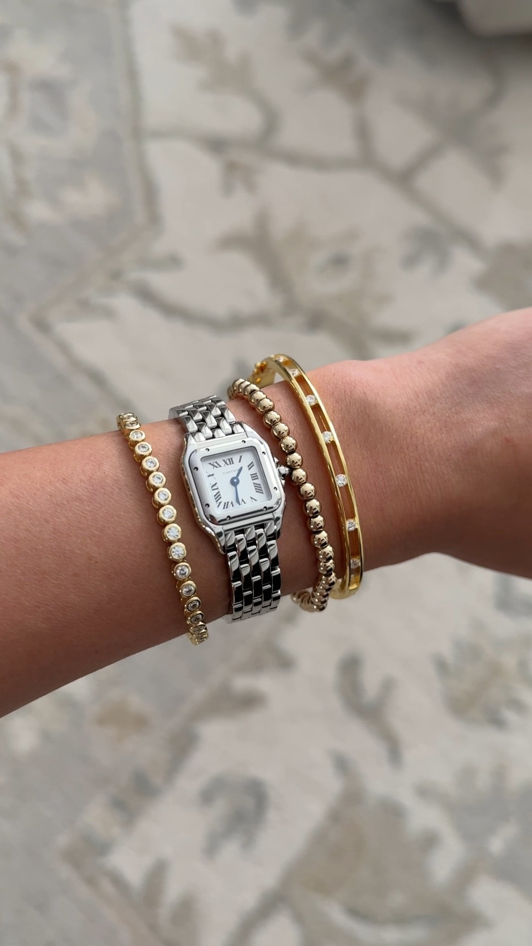 Today’s stack: my bracelets here are gold plated since I wanted to try out wearing these styles and diameters before investing in the pricier fine / deminfine jewelry versions! 

I linked the exact as well as the fine jewelry versions that are available in small wrist sizes. 

 measured my wrist and it’s 5.5” and I’m usually a size small in Mejuri bracelets.

• sami jewels on etsy tennis bracelet 6” nice weight to it. The Etsy shop gold plating is on the yellower toned side 

• bangle bracelet 6” this is a little loose on me due to the bangle style I’m between their sizes. Note there are no stones on the backside. 

• baublebar 3mm beaded bracelet 6.25” band is stretchy and doesn’t feel as big on me. I’ve had this one for maybe 3 years and no issues! 

Jewelry for small narrow wrists, Cartier panther mini, bracelet stack

#LTKPetite #LTKSummerEdit #LTKFindsUnder100