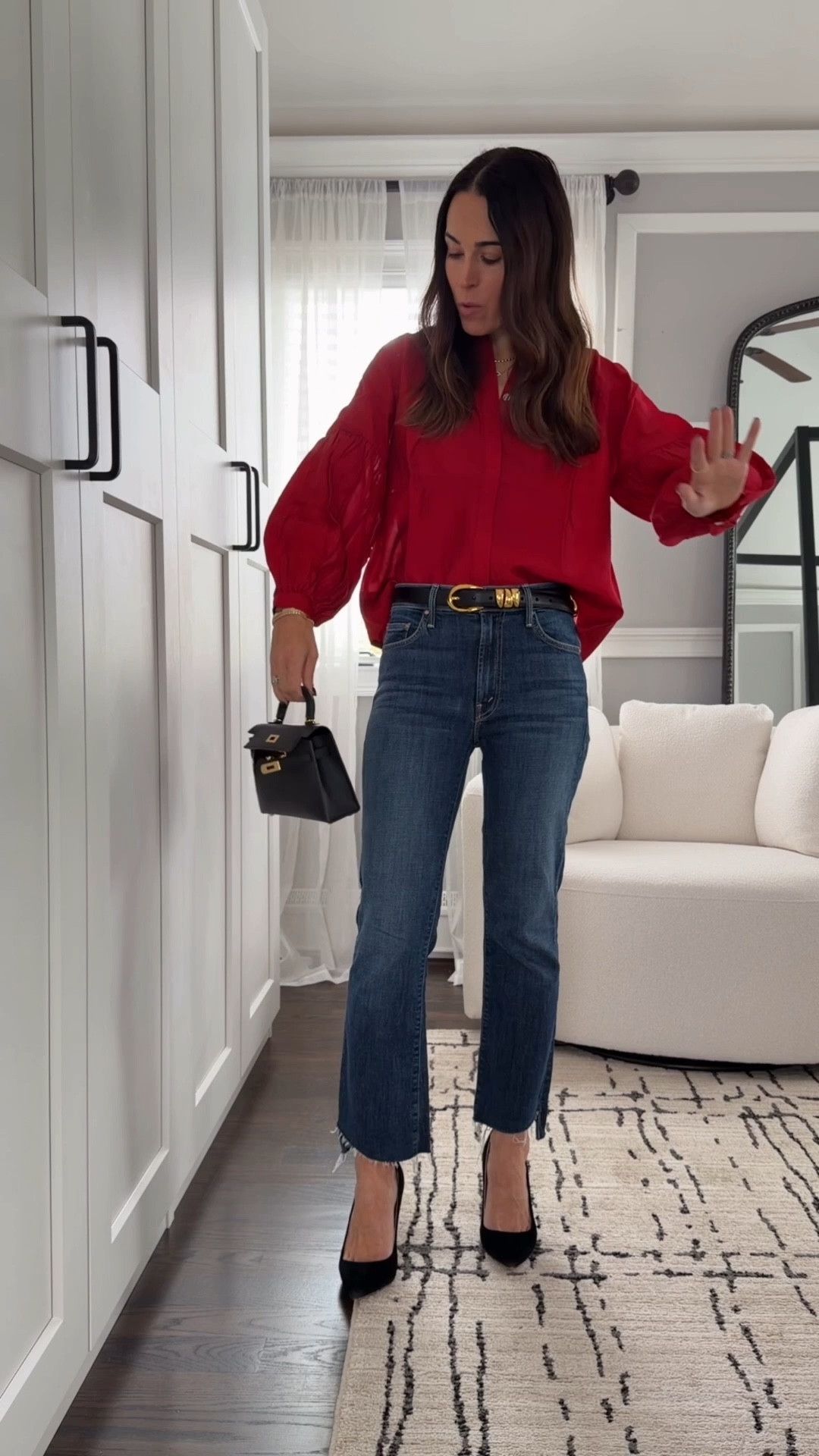 A red top is always a holiday must ❤️ This one is flowy, flattering, and easy to style with jeans for a polished but effortless look. Great for family parties, dinners, or holiday photos. Wearing size xs and 25 jeans 

#LTKSeasonal #LTKOver40 #LTKHoliday