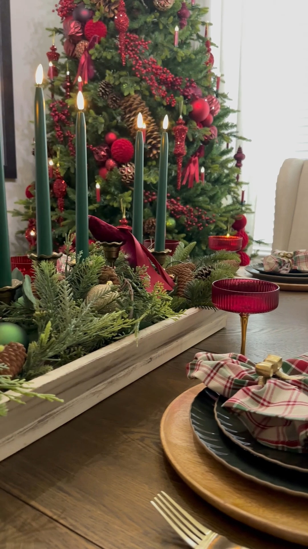This Christmas dining tablescape in deep reds, burgundy and green is a beautiful way to entertain this holiday.

#LTKSeasonal #LTKHome #LTKSaleAlert