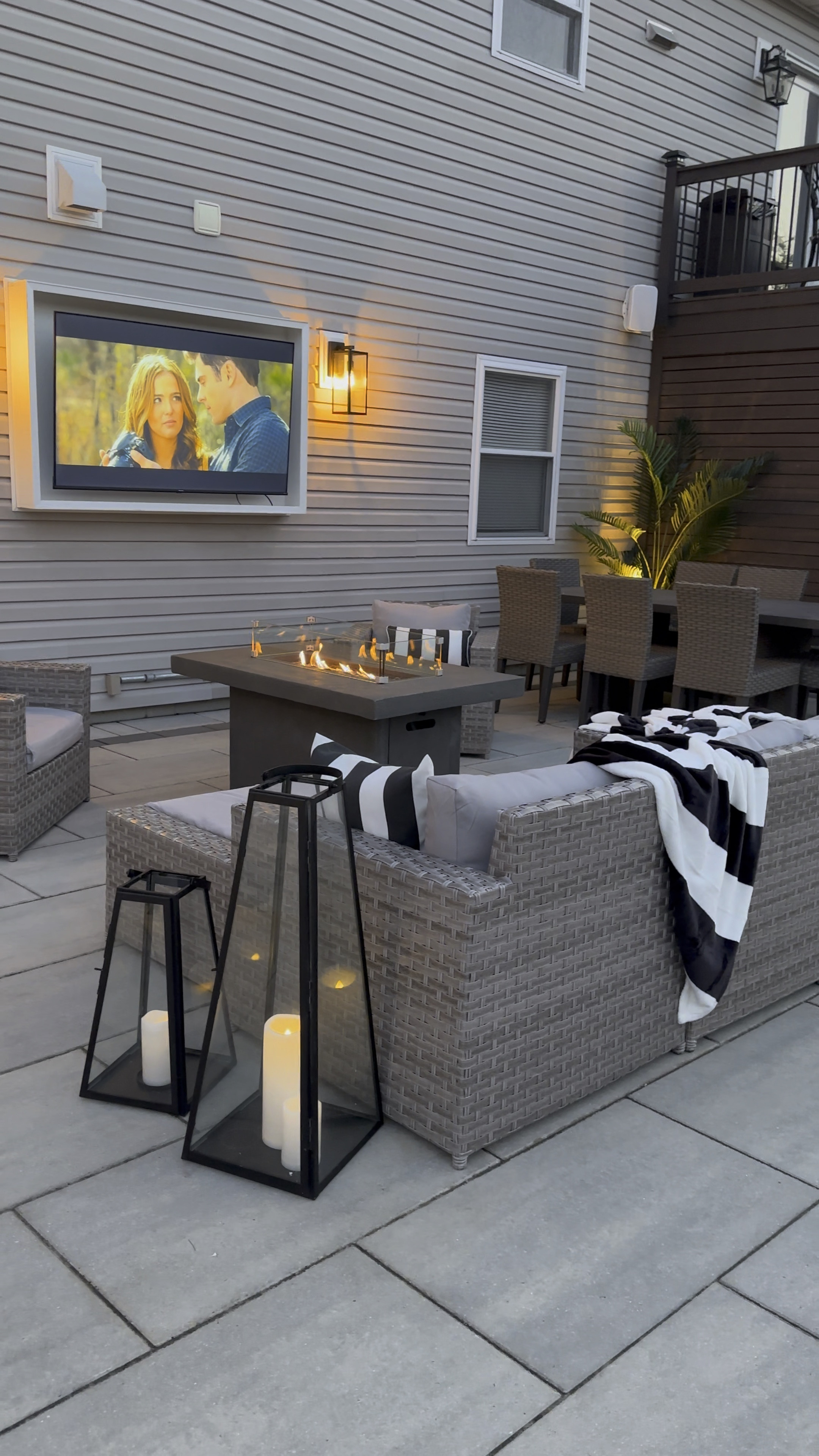 Create your perfect outdoor oasis! Backyard patio set, outdoor living, outdoor wicker modular sofa, black white stripe blanket throw, outdoor lantern scones, concrete fire table, realistic palm tree, black white outdoor striped pillow, outdoor lanterns, outdoor tv, outdoor candles

#LTKhome #LTKSeasonal #LTKsalealert