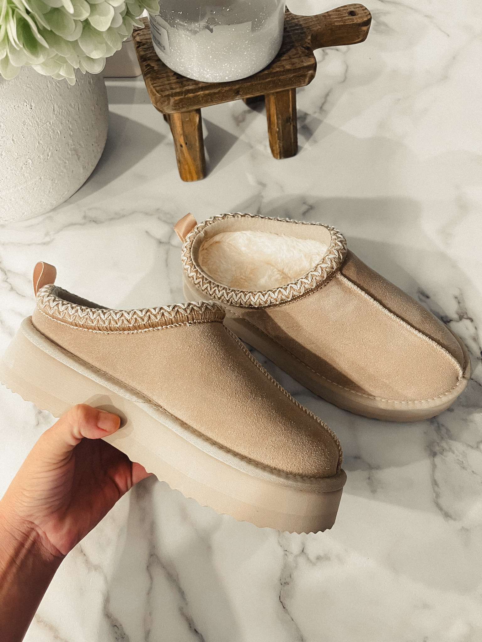 Step  into cozy comfort with these UGG-inspired DREAM PAIRS Women's Slippers from Amazon! Made with genuine suede and a platform design, these fuzzy and warm slippers are perfect for winter days at home or outdoors. Treat your feet to ultimate comfort and style! #CozySlippers #WinterWarmth #FuzzyShoes #DREAMPAIRS #AmazonFinds"

"women's slippers," "genuine suede slippers," "platform slippers," "fuzzy cozy slippers," and "winter shoes." 

#LTKShoeCrush #LTKSeasonal #LTKFindsUnder50