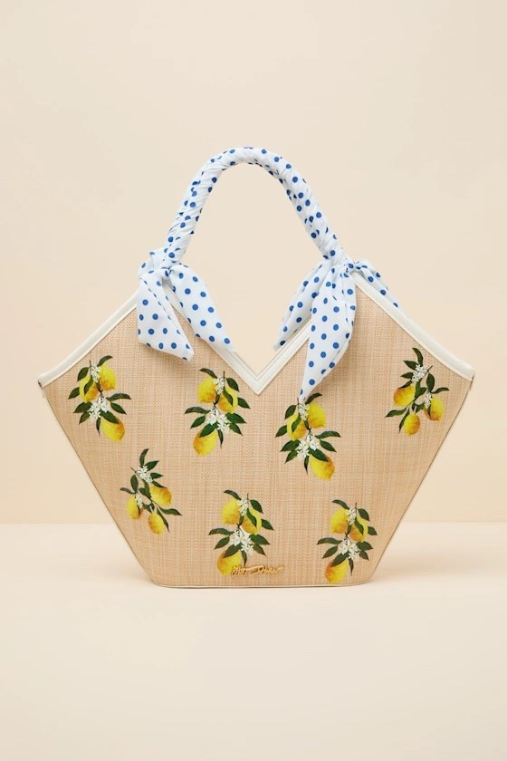 Let’s pack for a beach vacation with the Don't Be Tarty Natural Straw Tote Bag. This adorable tote bag features tropical lemons and delicate bows, and is under $110.

Keywords: Straw bag, beach tote bag, beach straw bag, tropical vacation, spring break, spring break handbags, crossbody bag, spring outfits women, summer vacation, summer tote bags, shoulder bag, summer outfits women, spring handbags women, summer handbags women, resort handbags, resort straw bag, resort outfits 2026

#LTKTravel #LTKootd #LTKSeasonal