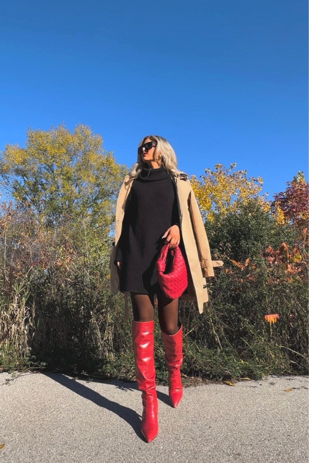 Cherry red boots, knee high stiletto boots, black oversized sweater dress, neutral trench coat, red weaving bag, fall fashion, winter fashion trends

#LTKSeasonal #LTKHolidaySale #LTKshoecrush