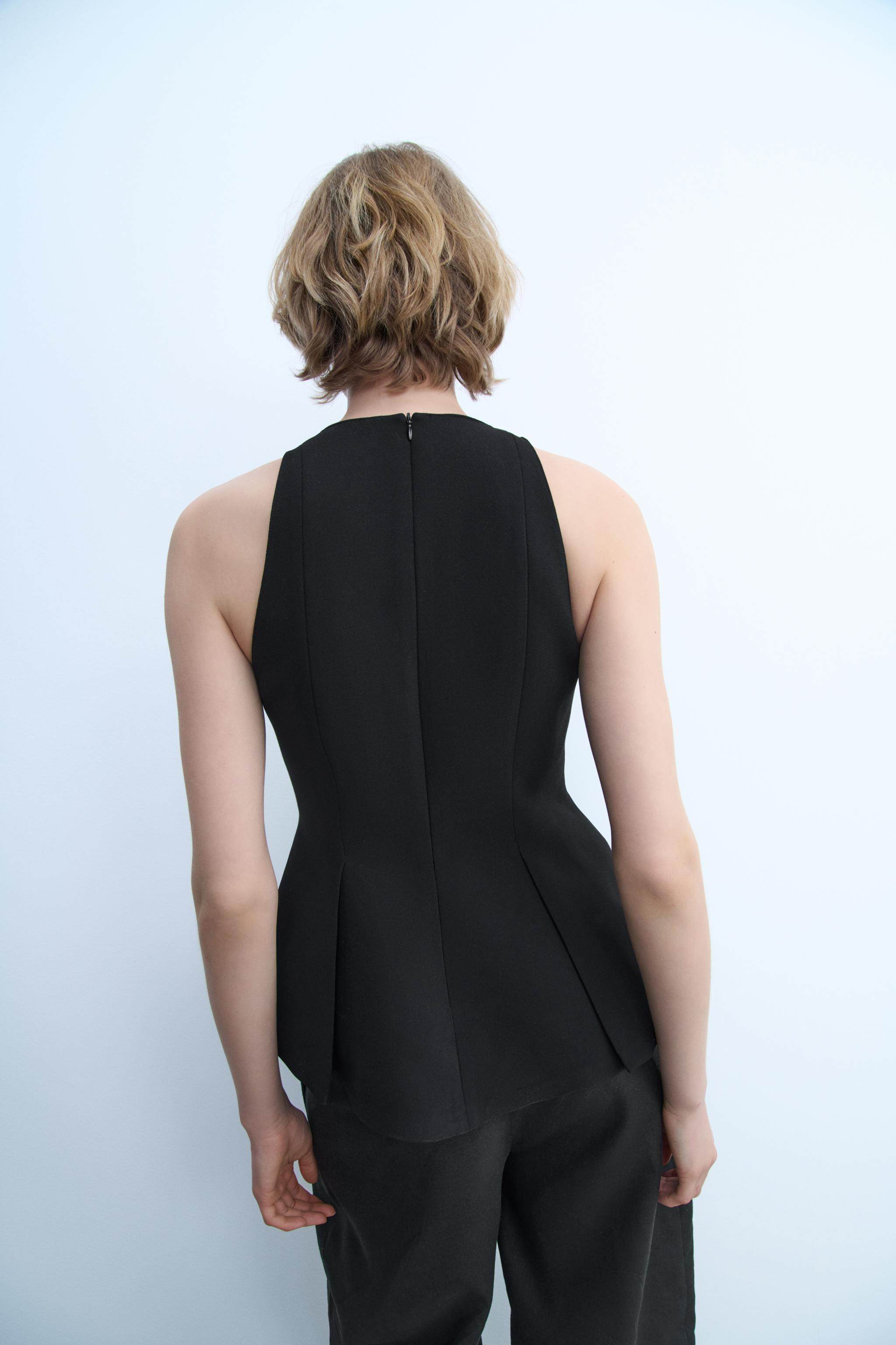 ZARA WOMAN COLLECTIONSleeveless round neck top. Pleated peplum hem. Back hidden in-seam zip closu... | Zara US