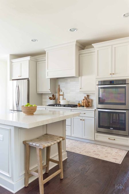 Changing out my kitchen cabinet fronts and repainting them Edgecomb Gray, with Alabaster walls and a white tile backsplash has really brightened up the space! home decor kitchen decor kitchen runner champagne bronze cabinet hardware leather counter stool kitchen island styling 

#LTKstyletip #LTKfindsunder50 #LTKhome