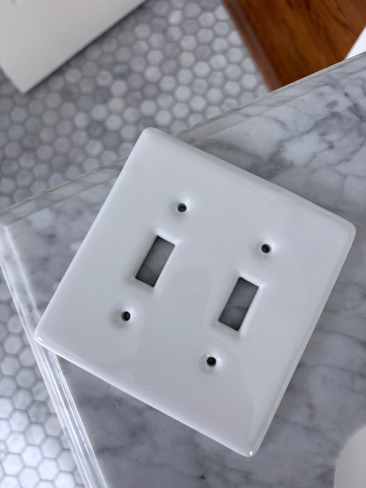 I recently swapped out the plastic switch plates in the bathroom and replaced them with ceramic for a small, but noticeable upgrade  

#LTKHome