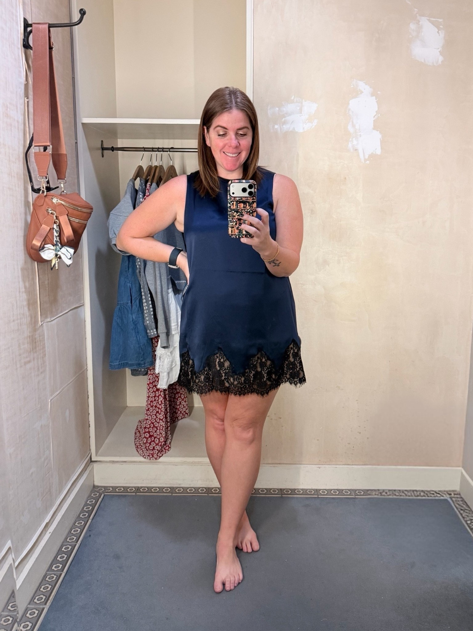 This Reformation dress is one I’ve been eyeing for a while! I love the navy and black combo and this dress can be dressed up or down, depending on where you want to wear it! This dress runs SUPER SMALL! I had to size up two sizes to get this fit, so definitely size up in this dress!

#LTKMidsize #LTKootd #LTKSeasonal