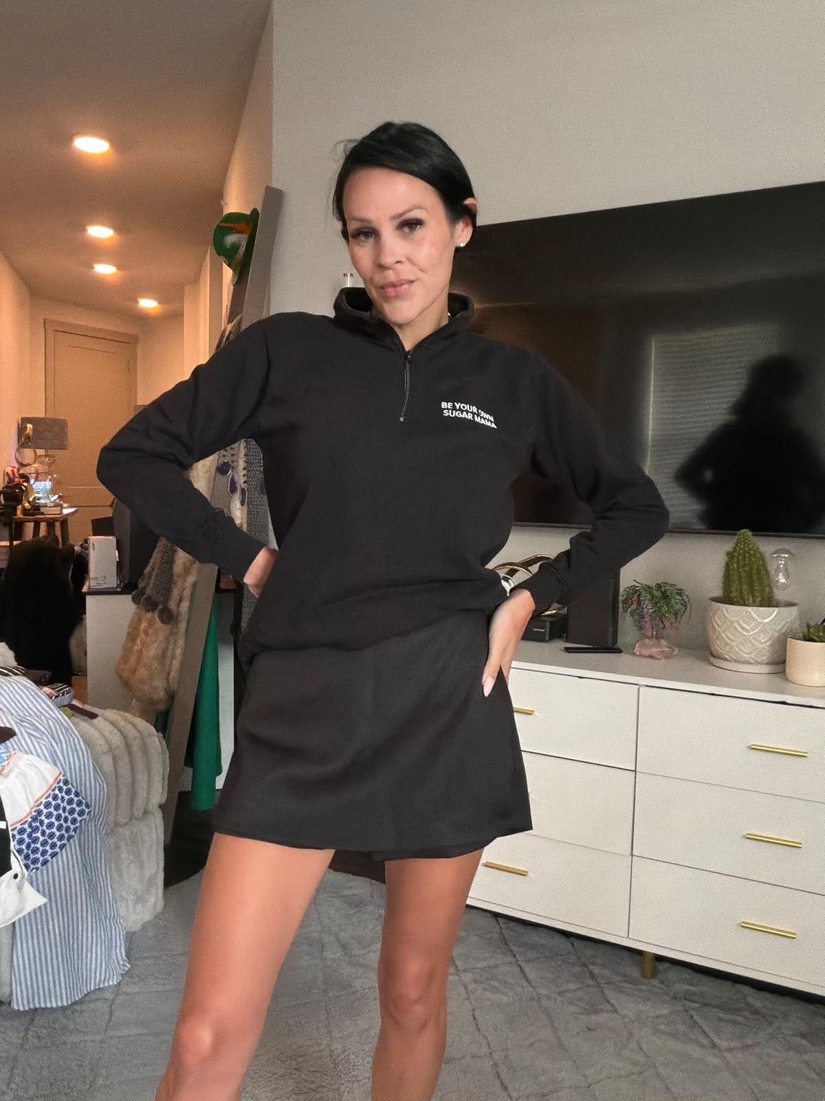 Loving the casual, sporty look! This comfy black quarter-zip paired with a matching athletic mini skort is the perfect go-to outfit for running errands or a busy day on the move. Click the link in my bio to shop the look! #LTKunder50 #AthleisureStyle #CasualOutfits 

 #LTKdayinmylife #LTKgrwm #LTKootd