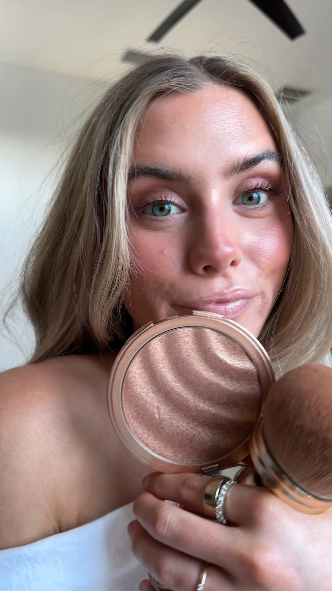 @koparibeauty Glow brighter with this ultra-radiant, mineral SPF 30 illuminator designed for effortless touch-ups and on-the-go protection. This easy-to-use compact delivers a buildable, warm golden sheen while protecting skin across face and body, enhancing your natural glow with a luminous finish.

The talc-free formula glides on smoothly without heaviness or chalkiness, creating a transfer-resistant radiance perfect for highlighting shoulders, collarbones, and décolleté. Designed for touch-ups, added protection, or layering over your favorite sunscreen, it makes reapplication effortless throughout the day. Lightly scented with Kopari’s signature sweet coconut milk, it’s your new glow-anywhere, glow-everywhere SPF. @ulta @kopari 

#LTKgrwm #LTKSwim #LTKBeauty