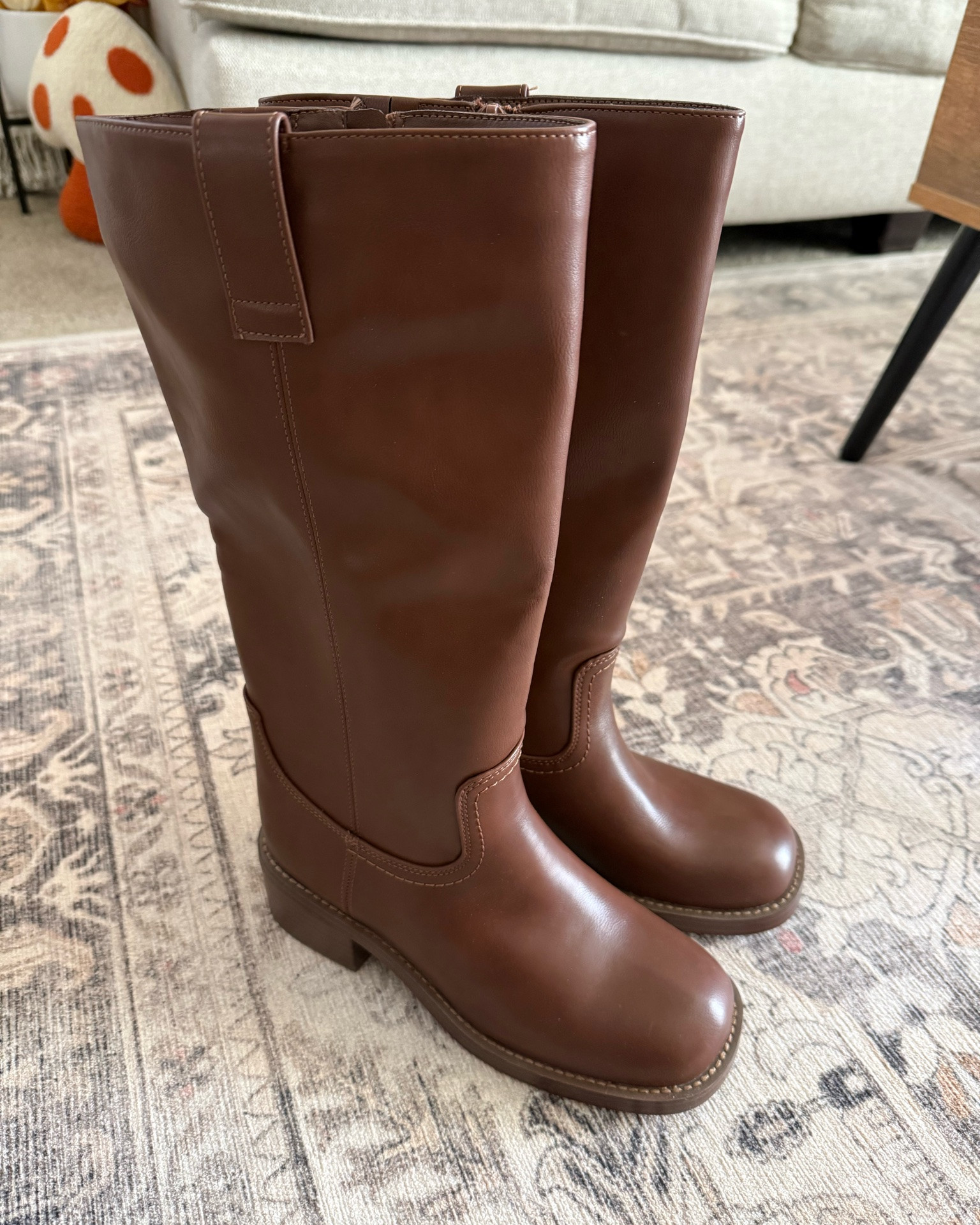 These cute casual boots from Target are a strong choice for fall and winter. My daughter loves them, and they fit true to size. They also work well for wide calves.