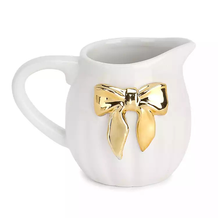 New! Gold Bow Ceramic Creamer | Kirklands