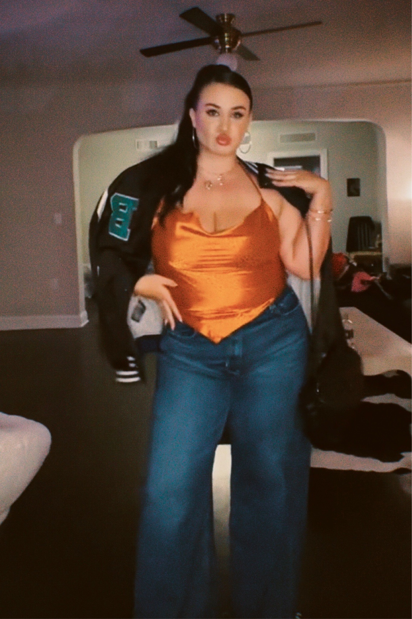My fit for going out to dinner and dancing! Silky orange halter, the most perfect wide leg jeans and an oversized bomber 🎵👠💅

#LTKcurves #LTKunder50 #LTKunder100