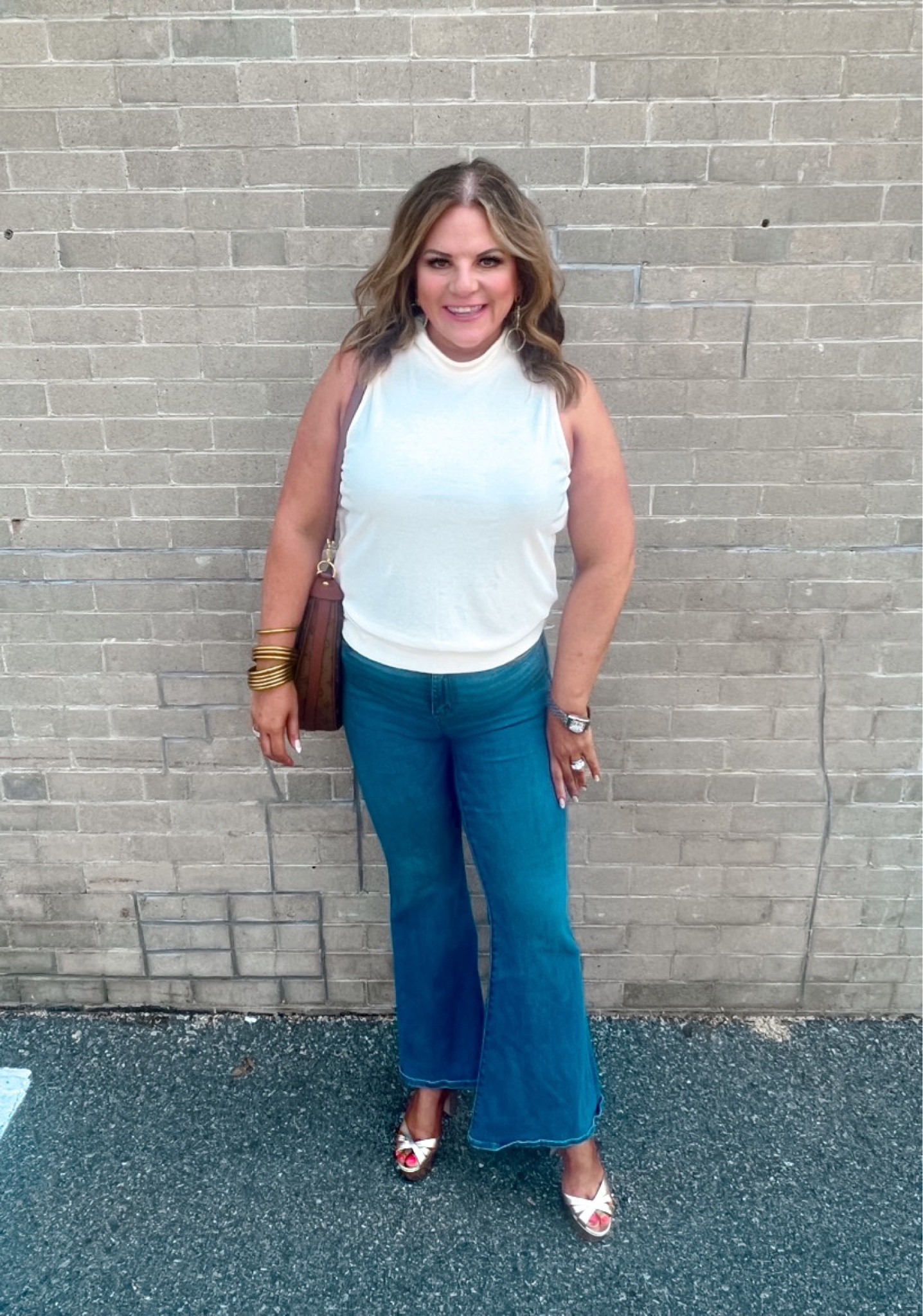 Disco fever coming in HOT. From these flare jeans to the gold platform shoes. This outfit makes me want to crank up the BeeGees 🕺🏼🕺🏿
Wearing head to toe Evereve. They NEVER disappoint ! This top is currently on sale for under $50!
Evereve, Platforms Sandals, Flare jeans

#LTKFind #LTKSeasonal #LTKunder50