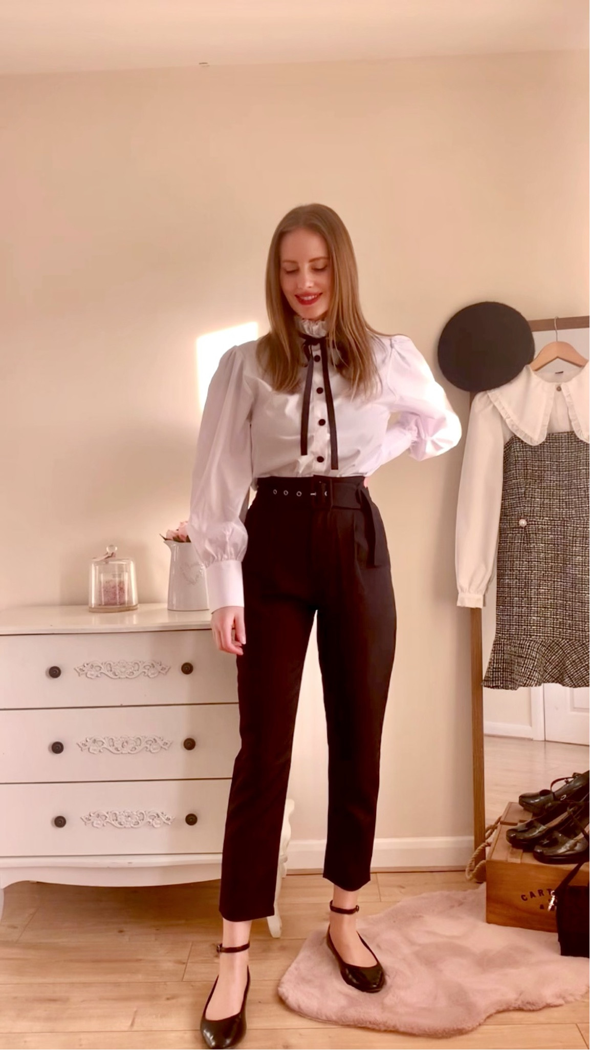 Parisian look 🤍🖤
White shirt high neck frills black bow front 
Black high waist belted trousers 
Mary Janes shoes 
Spring outfit 
Classy elegant feminine outfits

#LTKfit #LTKunder50 #LTKstyletip