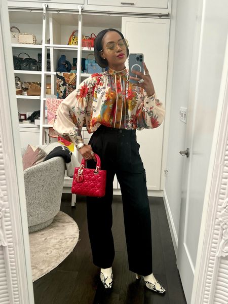 Today’s outfit of the day. Love this beautiful floral print blouse. It’s a summer blouse but I make it fall ready with the perfect pair of black pants and ivory and black boots. 

#LTKstyletip #LTKover40