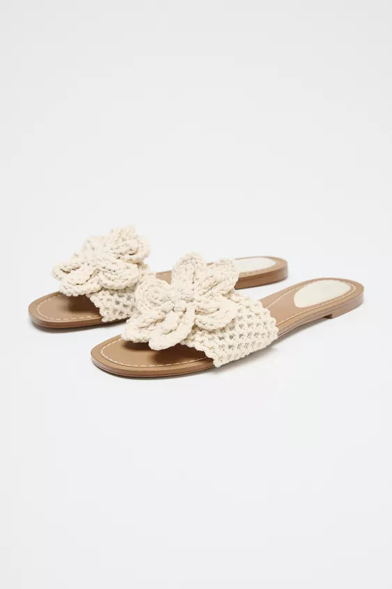 Flat sandal shoes. Crochet fabric upper. Strap with maxi flower detail on the front. Round toe.So... | Zara UK
