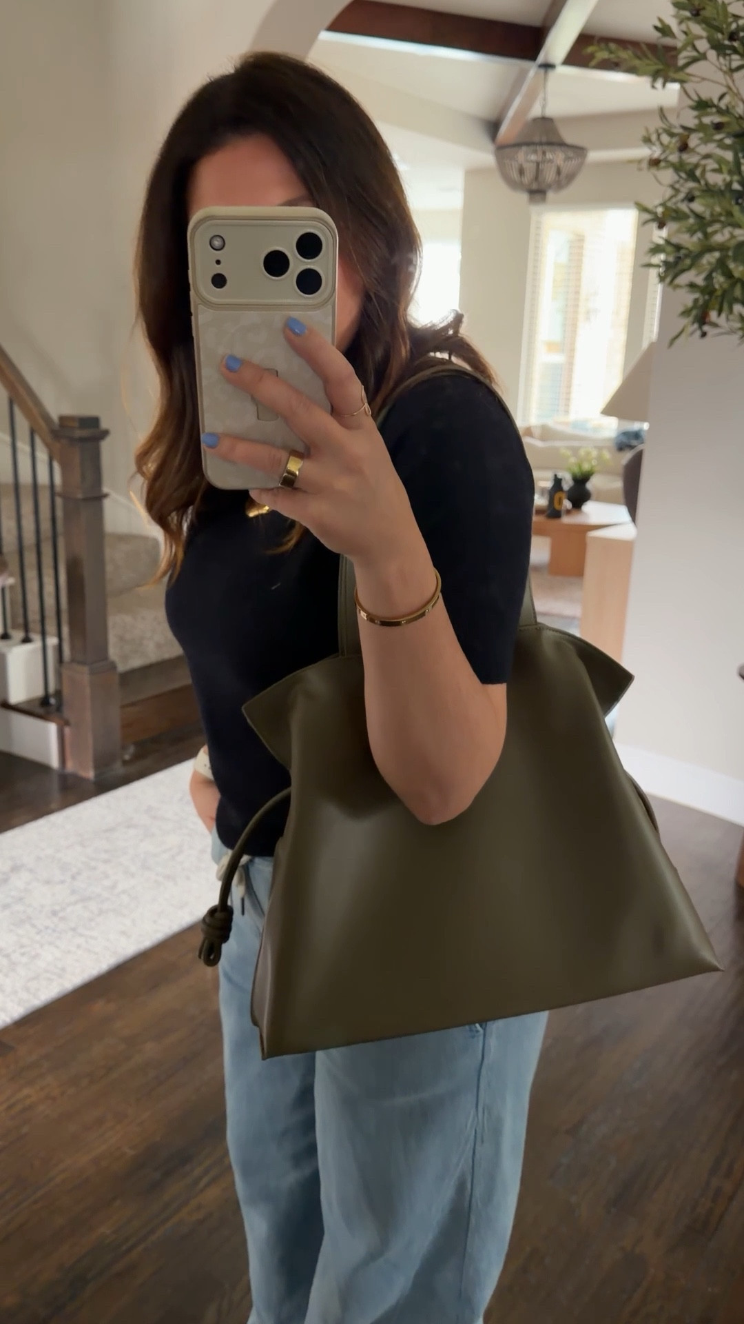 When it’s giving Loewe but it’s literally $3000 cheaper!!! This genuine leather, olive green tote is so yummy and soft! The dark khaki green color is absolutely stunning!!!! And it’s on. Sale right now! Making a whole YouTube video on it so make sure you check that out! #ltkitbag

#LTKWorkwear #LTKSaleAlert #LTKmomlife