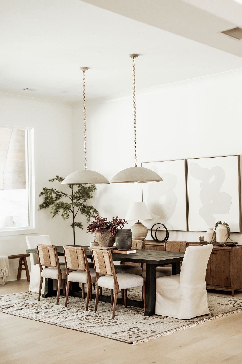 Every element in this space was designed to invite connection — the soft curves of the pendants, the warmth of the wood tones, and the balance of natural textures. ✨
It’s the kind of dining room that feels elevated yet effortless — where every dinner turns into a lingering conversation and every detail feels intentional. 🤎 

✨ Do you want to bring our dreamy Modern Classic style interior design into your own home? 🏡
You’re in luck! Reserve our Online Interior Design packages today → https://porcheandco.com/edesign ✨
We can’t wait to work with you & design your home with #porcheandco

#diningroomdesign #modernclassic #interiordesign #porcheandco #neutraldecor #earthytones #moderndiningroom #cozyhome #warmneutrals #homedesign #homeinspo


#LTKvlog #LTKHome #LTKdayinmylife