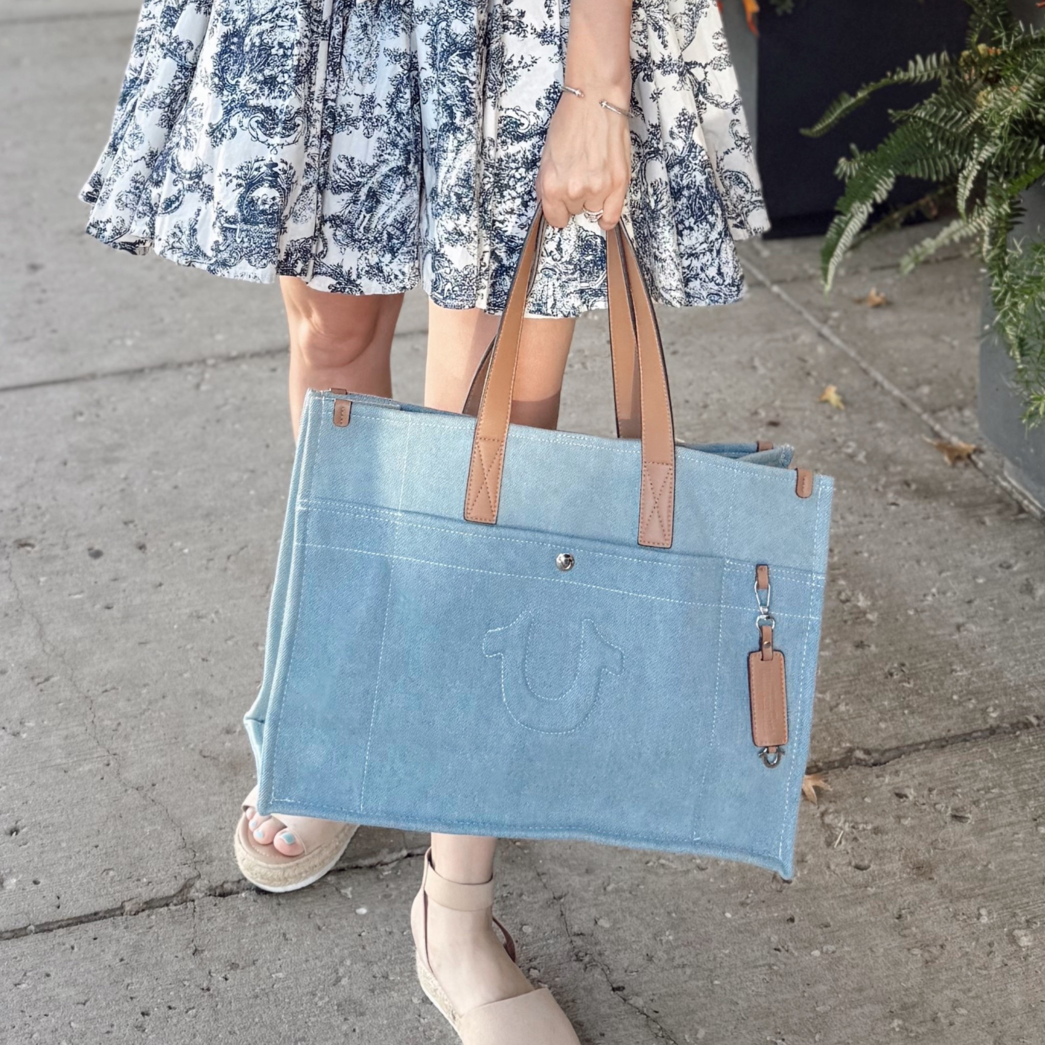 My true religion denim shoulder bag is on major sale right now! I use this as a diaper bag  

#LTKSaleAlert #LTKItBag #LTKFindsUnder50