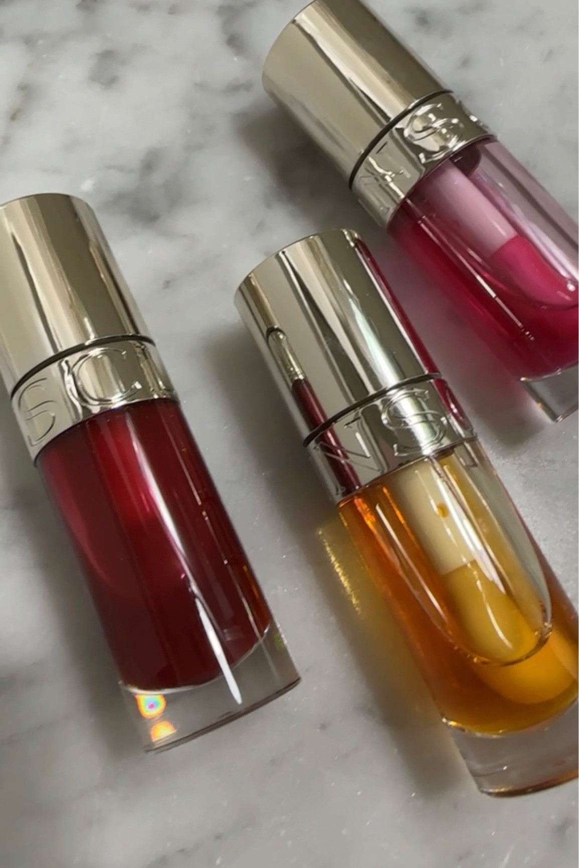 Clarins Lip Oil 
Nourishing, plumping, ph changing 

#LTKbeauty #LTKtravel #LTKunder100