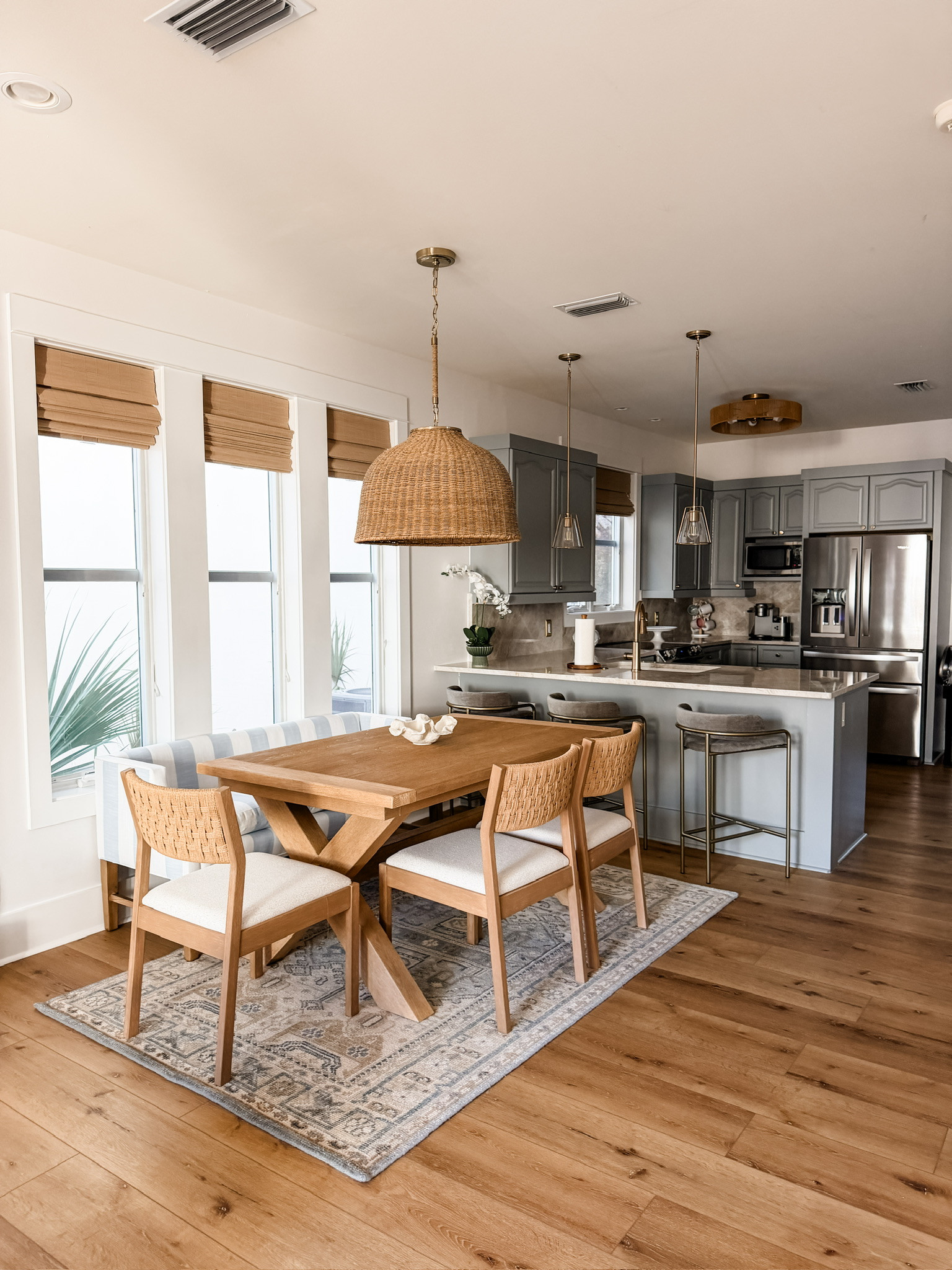 This is our dining area and the kitchen updated! Loving all the cool blues and greys together! The color of the cabinets is Sherwin Williams "Earl Grey"

Loverly Grey, home decor, home inspo, beach house, home finds, kitchen inspo, dining room 

 #LTKHome