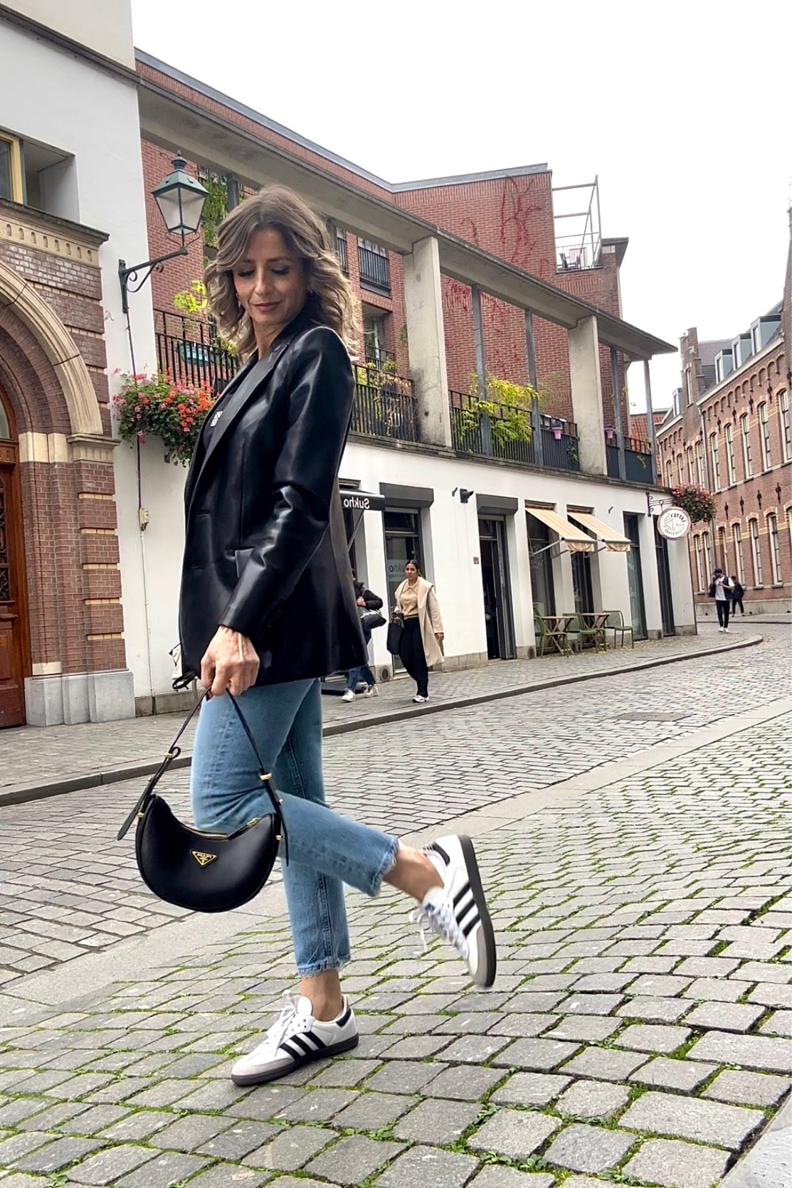 First day in the Netherlands. Today is the warmest. Temperature will go down from here, but I cane prepared 🥰 

This is a casual chic streetstyle look. The AGOLDE denim fits large. I always size down to a 23. This specific one has a bit of stretch.

Love my Adidas Samba. They give such a cool vibe to the look.

#LTKover40 #LTKstyletip