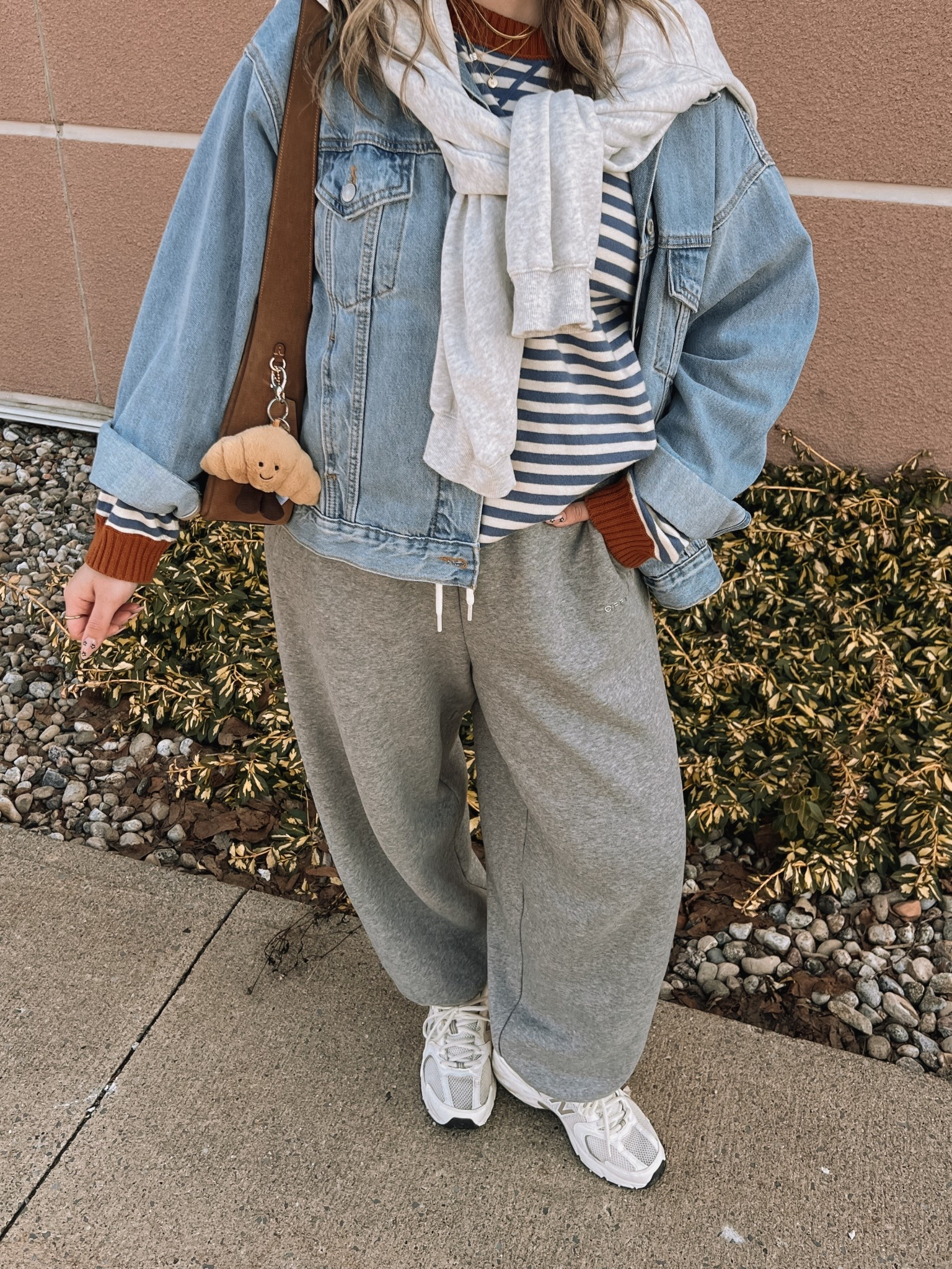 Easy outfit idea for early spring! Wearing my usual size L in the sweatpants and striped sweater - both are so soft! Sized up to XL in the denim jacket for an oversized fit, also linked similar. New Balance sneakers are so comfy for walking but run a little big, I’m a 9.5-10 and wear a 9. 