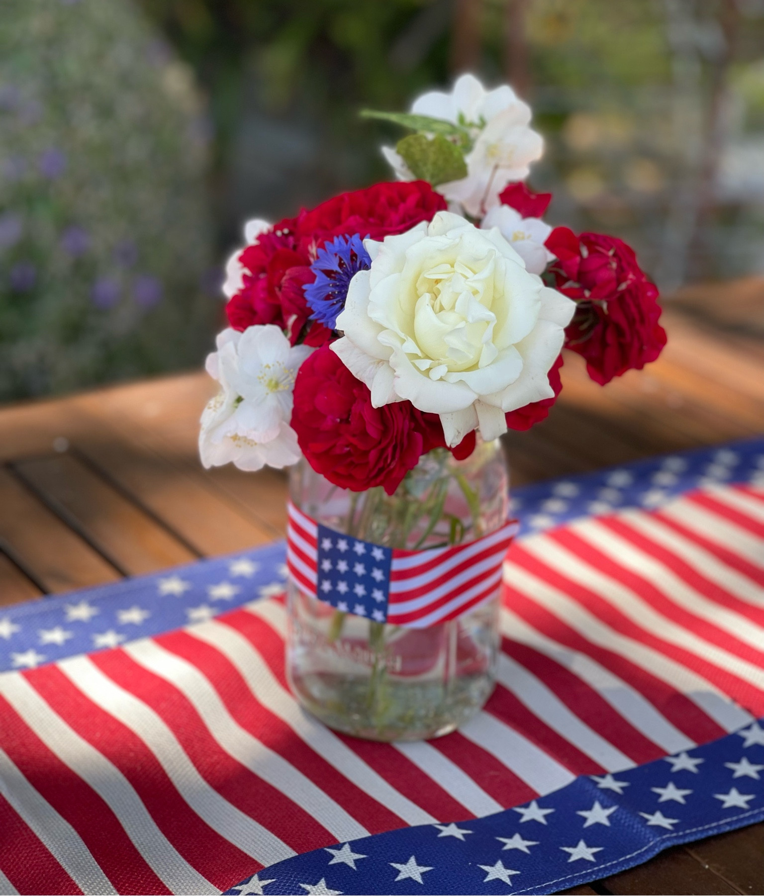 Memorial Day floral bouquet. Stars and Stripes table runner. Red white and blue tablescape. Red white and blue table runner. Stars and Stripes ribbon. Patriotic table decor. 4th of July bouquet. 4th of July table decor. 4th of July tablescape. 4th of July table runner  Walmart finds. Walmart home. Amazon home. Amazon finds. Outdoor furniture. Affordable wood outdoor dining table. Amazon outdoor furniture. ❤️🤍💙🇺🇸 

#LTKunder50 #LTKhome #LTKFind