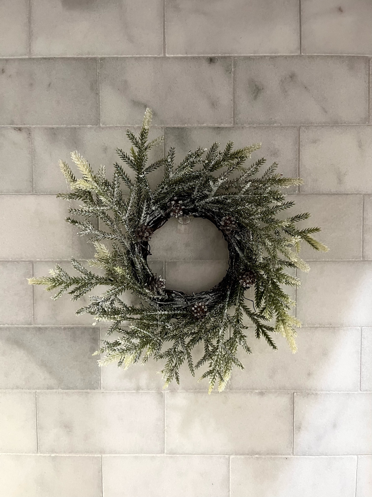Mini wreath for the kitchen. Amazon find. Set of 2 wreaths. Wreaths with glitter. Wreaths with snow. Holiday decor. Frosted wreath. Mini wreath with pinecones. 

#LTKHome