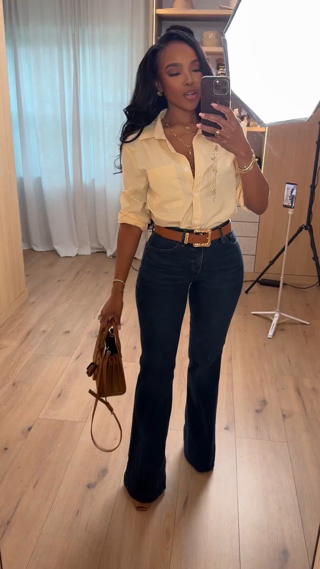 🤎 THE OUTFIT THAT LOOKS EXPENSIVE EVERY TIME 🤎

A crisp button-down, dark wash denim, and rich brown accessories will never fail you. This is one of those timeless combinations that always looks polished, put together, and effortlessly chic.

✨ Why I love this look:
• Classic white button-down
• Flattering dark wash flare jeans
• Rich cognac belt and bag details
• Comfortable enough for all day wear
• Gives that elevated luxury look without trying too hard

Perfect for:
• Work meetings
• Brunch
• Date night
• Church
• Travel days
• Everyday elevated style

If you're building a capsule wardrobe, start with pieces like these. You'll reach for them over and over again.

Everything is linked below!

xx Kira | IG: KirasFashionFinds

34D - 27 - 40 • Size Small or 4