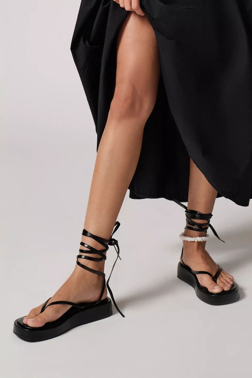 You May Also Like

              
            Jeffrey Campbell Wavin Platform Thong Sandal
      ... | Urban Outfitters (US and RoW)