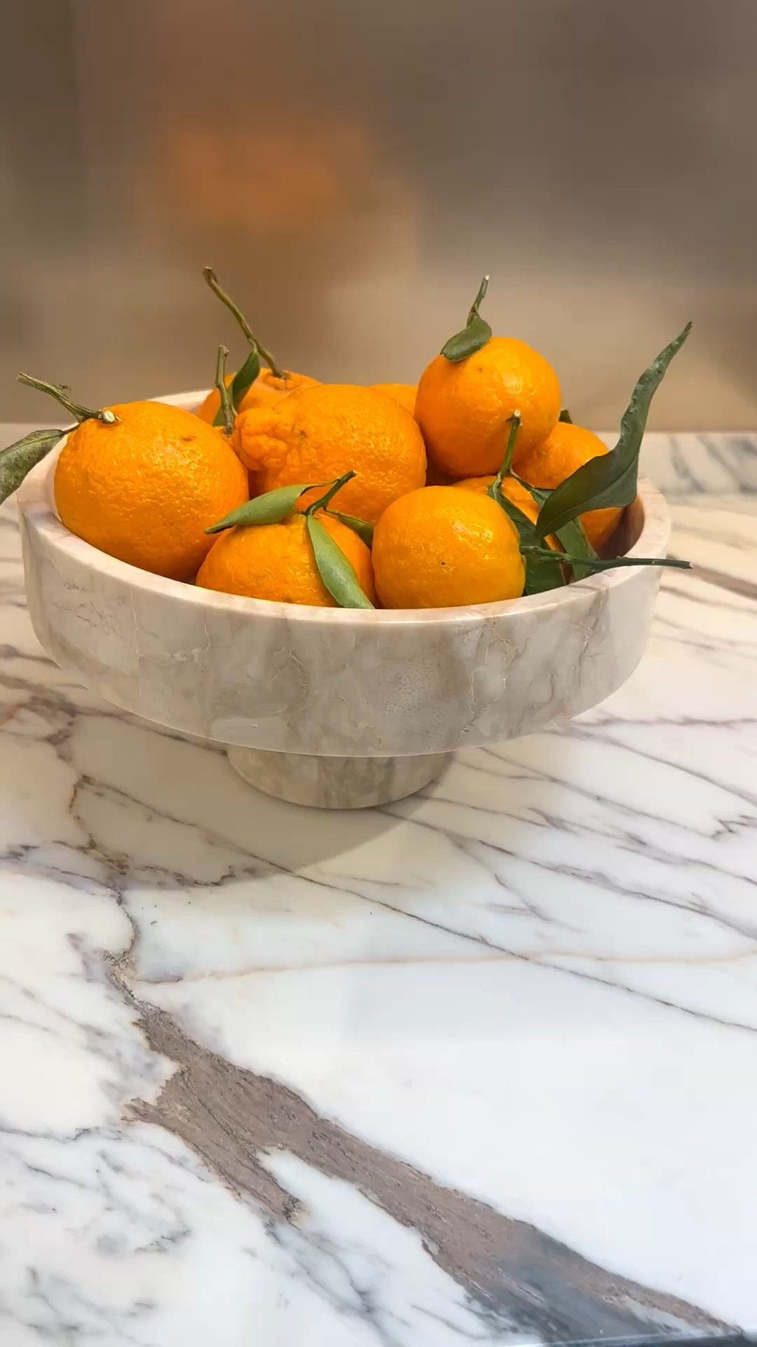 Sculptural stone bowls on the kitchen counter — modern, natural, and filled with fresh tangerines and fruit. A simple everyday pleasure that adds warmth, texture, and a touch of appetite to the space.


#SculpturalBowls #NaturalStone #KitchenStyling #FruitDisplay #EverydayPleasure #ModernKitchen #DesignDetails #LTKHome

#LTKFestival #LTKSaleAlert #LTKHome