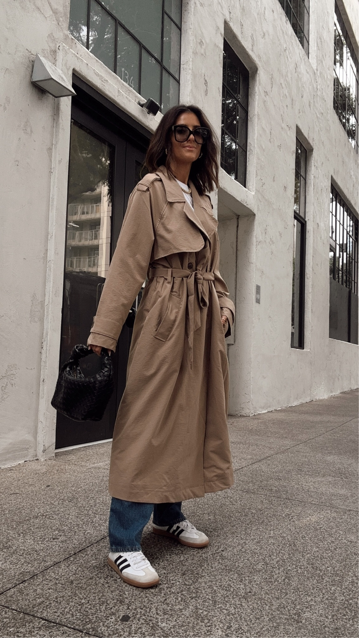 Budget friendly target outfit! I'm just shy of 5-7" and sized up a couple of sizes for more of an oversized fit on this trench coat. Wearing the size L and S tee.

#LTKSeasonal #LTKStyleTip #LTKFindsUnder100