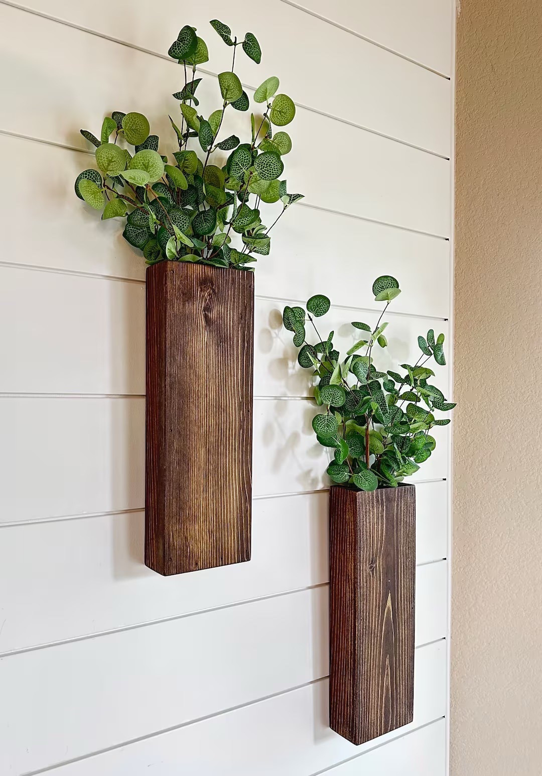 Add a cozy, elevated touch to your walls with these handcrafted rustic farmhouse sconces, designed to bring natural texture and charm into any space. Made from beautifully stained wood and accented with soft eucalyptus, each piece offers a warm, inviting feel while showcasing thoughtful craftsmanship and upcycled elements. Perfect for flanking a mirror, styling an entryway, or adding interest to a living space, these sconces create an effortlessly curated look with timeless appeal. #LTKhome #farmhousestyle #walldecor #rusticdecor #homedetails #cozyhome #eucalyptusdecor #neutralhome

#LTKSeasonal #LTKHome