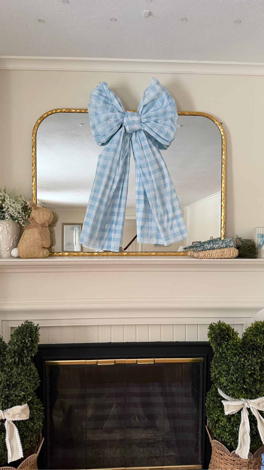Comment SHOP for the links to these $2 gingham tablecloths and everything I used to style my mantel and fireplace so far! 

These tablecloths caught my eye immediately! I love that gingham is so huge right now and this bow is going to be the centerpiece for my living room this spring. These bows take under a minute to make and they would be perfect for a baby shower, birthday party, etc! 

#LTKSeasonal #LTKHome