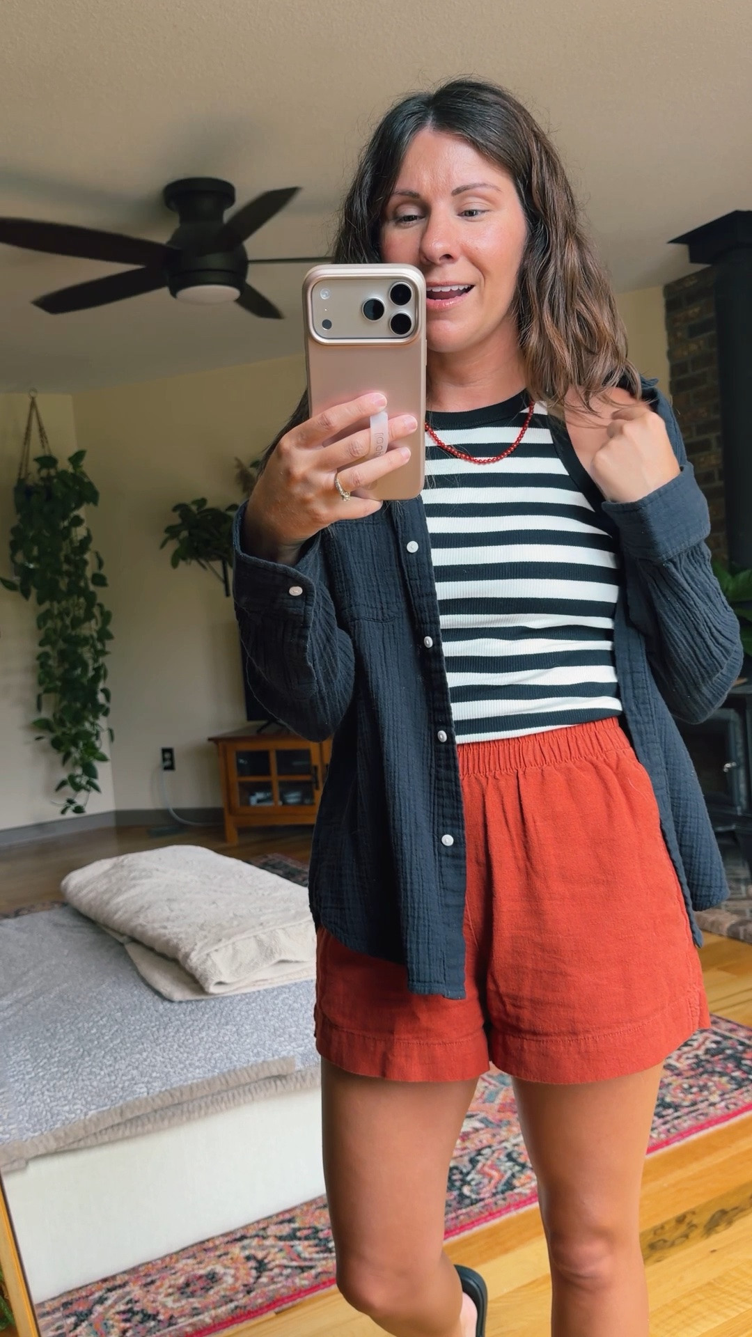 xs in my tank (has a built in bra!), xs in my black gauze cotton button down, and xxs in my linen shorts. My croc sandals are size 6.

#LTKPetite #LTKSeasonal #LTKBeauty