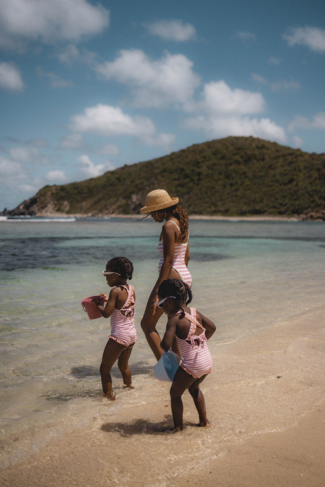 Mommy and me matching pink striped swimsuits 

#LTKFamily #LTKBaby #LTKKids