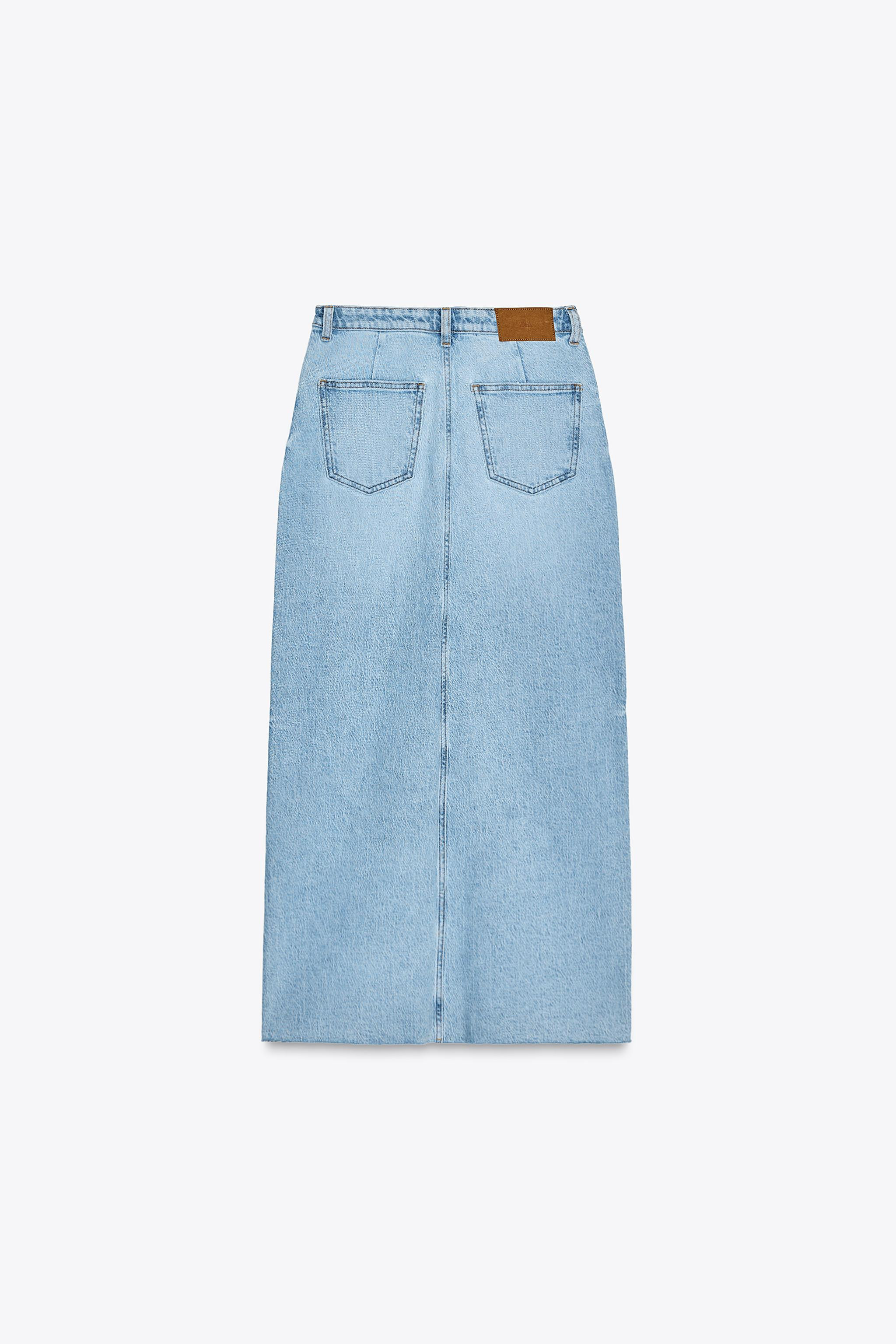 High waisted skirt with five pockets. Front slit and unfinished hem. Front zip and button closure... | Zara US
