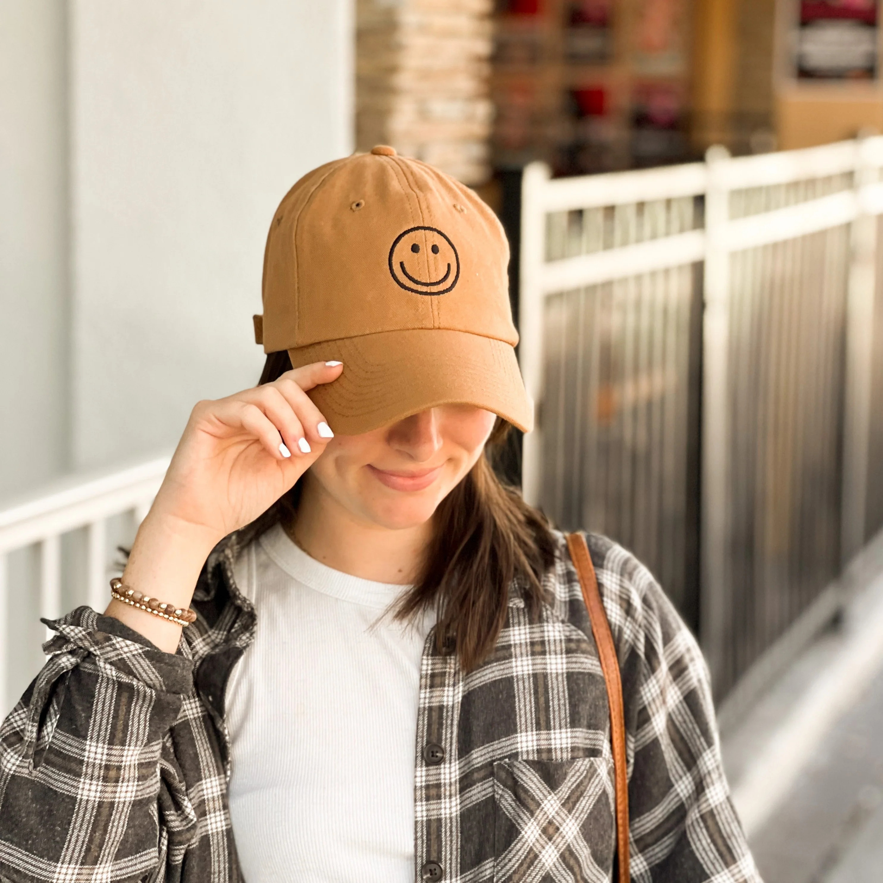 smiley face hat | camel | Reef rain aria