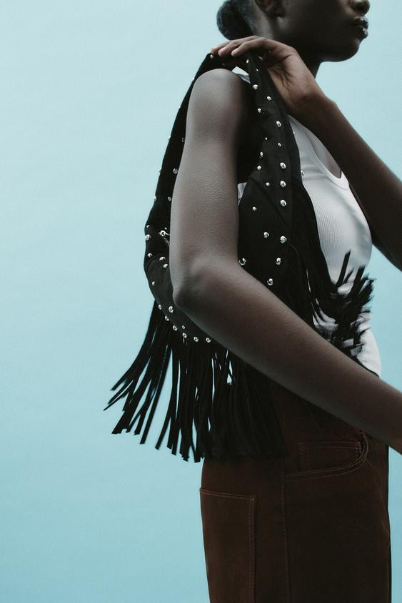 OVAL FRINGED STUDDED BAG$ 89.90Black | 6255/510/800Add to cartAddSoft oval bag. Stud detail on th... | Zara US