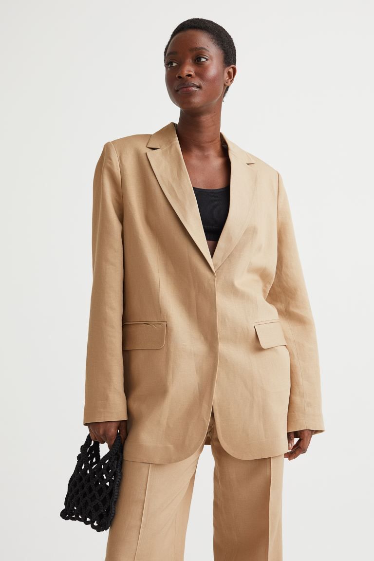 Oversized, single-breasted jacket in woven fabric with notch lapels, a concealed button fastening... | H&M (UK, MY, IN, SG, PH, TW, HK)