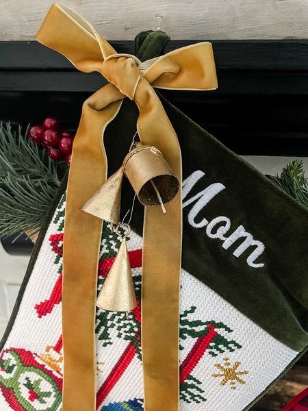 Christmas stockings with added bells and velvet bows 

#LTKHoliday #LTKhome #LTKSeasonal