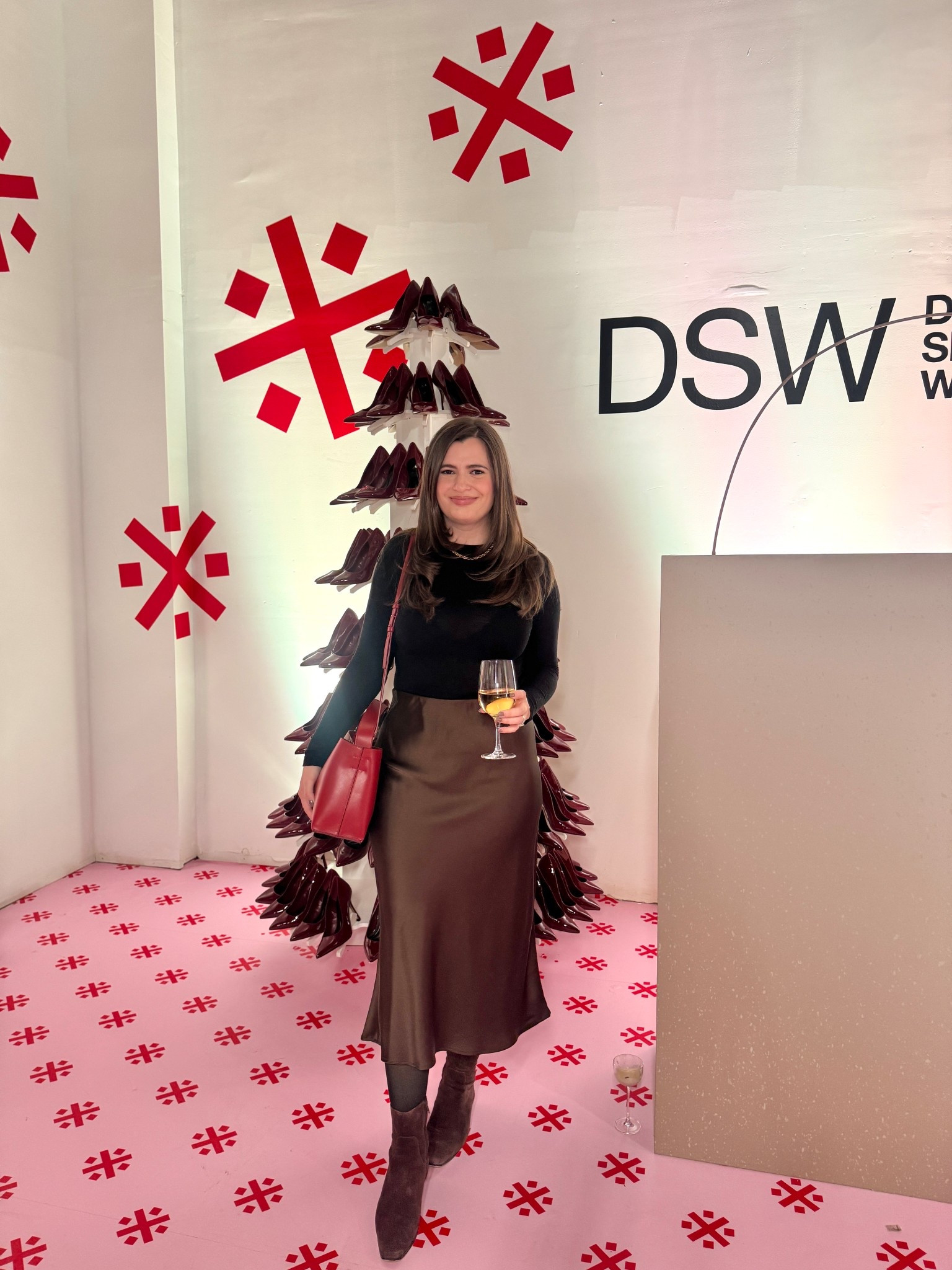 I loved this black and brown winter outfit I wore to the DSW holiday pop up in NYC! The brown satin midi skirt is from Zara but I linked some similar ones and paired it with suede chocolate brown boots  

#LTKFindsUnder100 #LTKHoliday #LTKootd