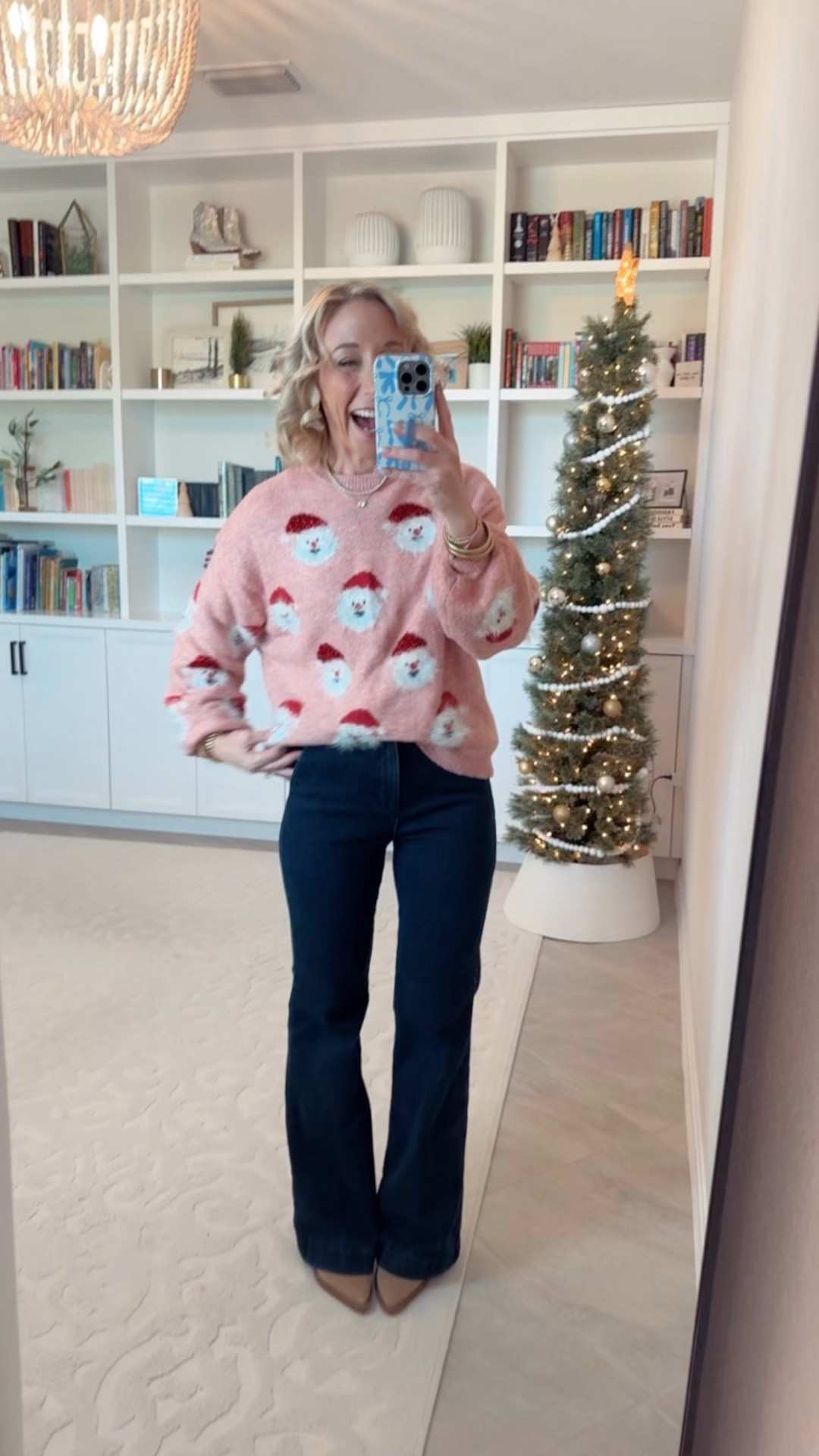 Santa sweater - size Small. * Trouser Flare High-Rise Jeans - size 0. $24.

#LTKOver40#LTKHoliday#LTKFindsUnder50 

 