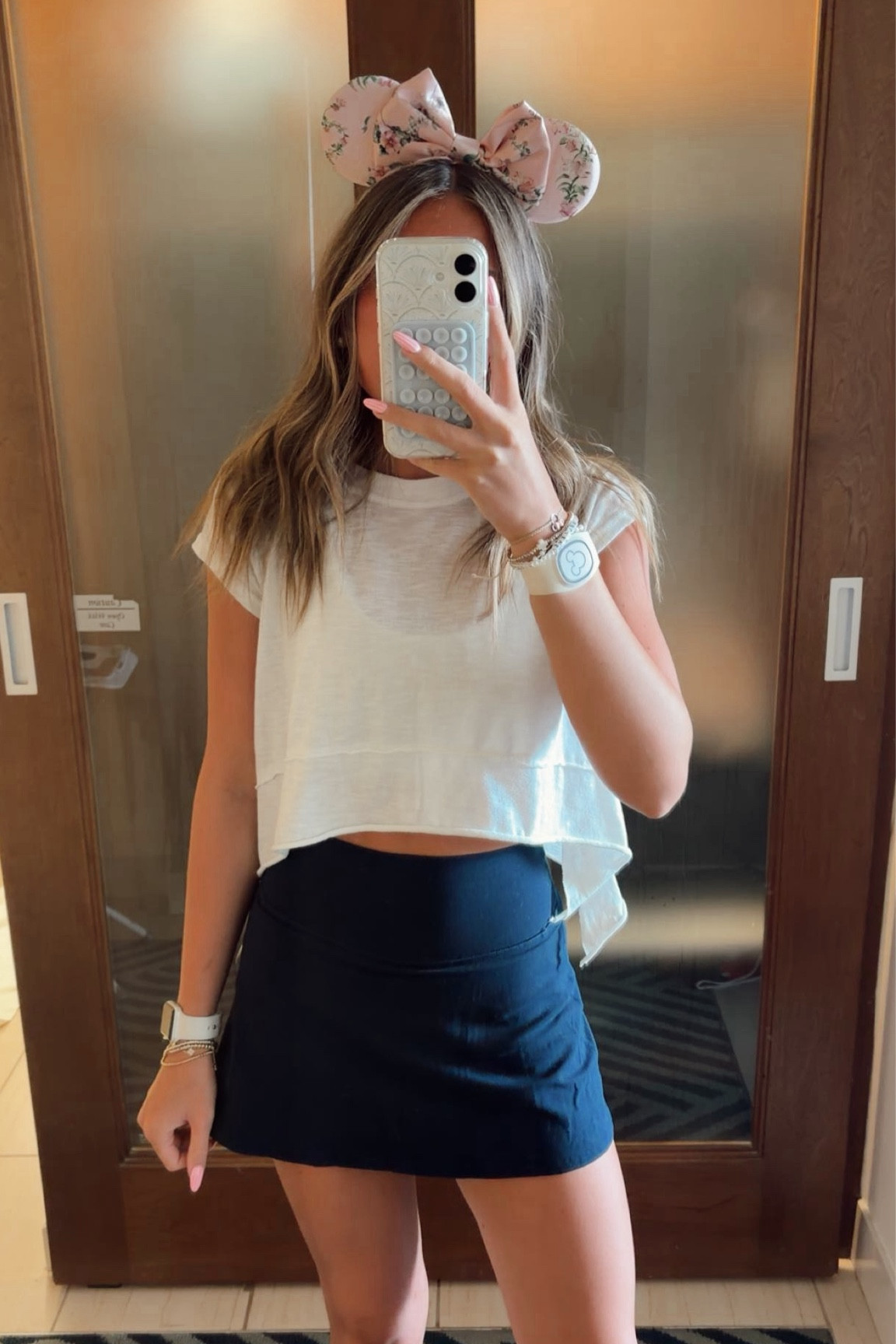 park outfit day 2!! wore this to animal kingdom and epcot!! this skirt from lulu is a fav, and comes in a few other colors. comfy and flexible for lotsss of walking!! the top is thin and breathable, perfect for the hot florida weather!! my ears are from amazon, but currently unavailable… i linked a similar pair! this outfit with my nikes is a perfect park all day outfit, while trying not to melt!! outfit is perfect for summer and i will be wearing it for everyday activities! so cute

#ootd #disneyoutfit #animalkingdom #disneyootd #summeroutfit #springoutfitinspo

#LTKActive #LTKootd #LTKfitnessgoals