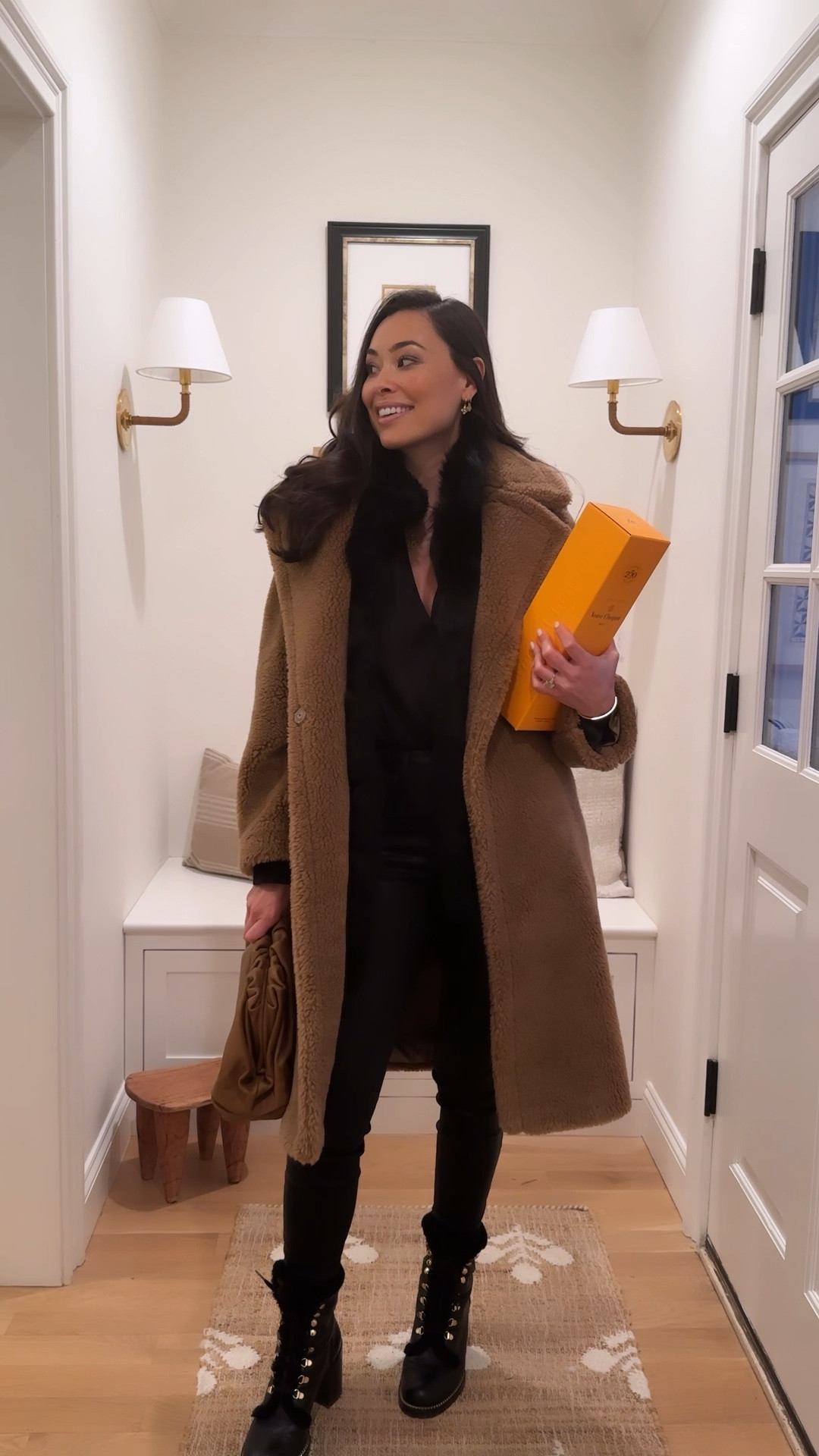 Kat Jamieson wears a winter outfit for a cocktail party in Connecticut. Sherpa coat, teddy coat, bodysuit blouse, skinny jeans, coated denim, black jeans, snow boots, lace up booties, fur vest, Bottega Veneta clutch. 

Coat is old Gerard Darel, similar below.

#LTKshoecrush #LTKparties #LTKSeasonal