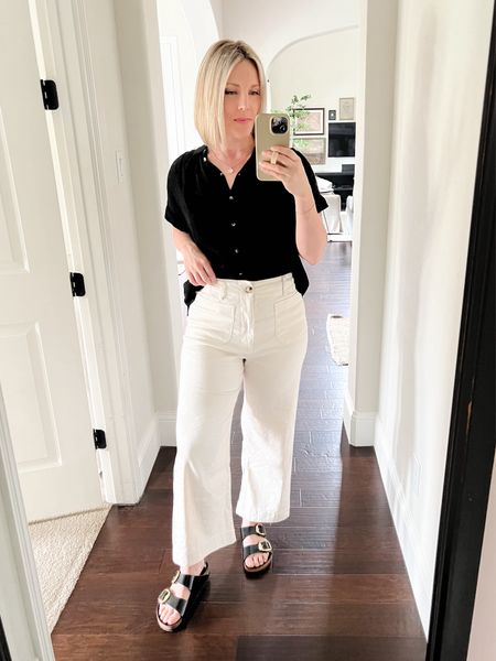 Black blouse, white linen cropped paints, black Birkenstocks



#LTKover40