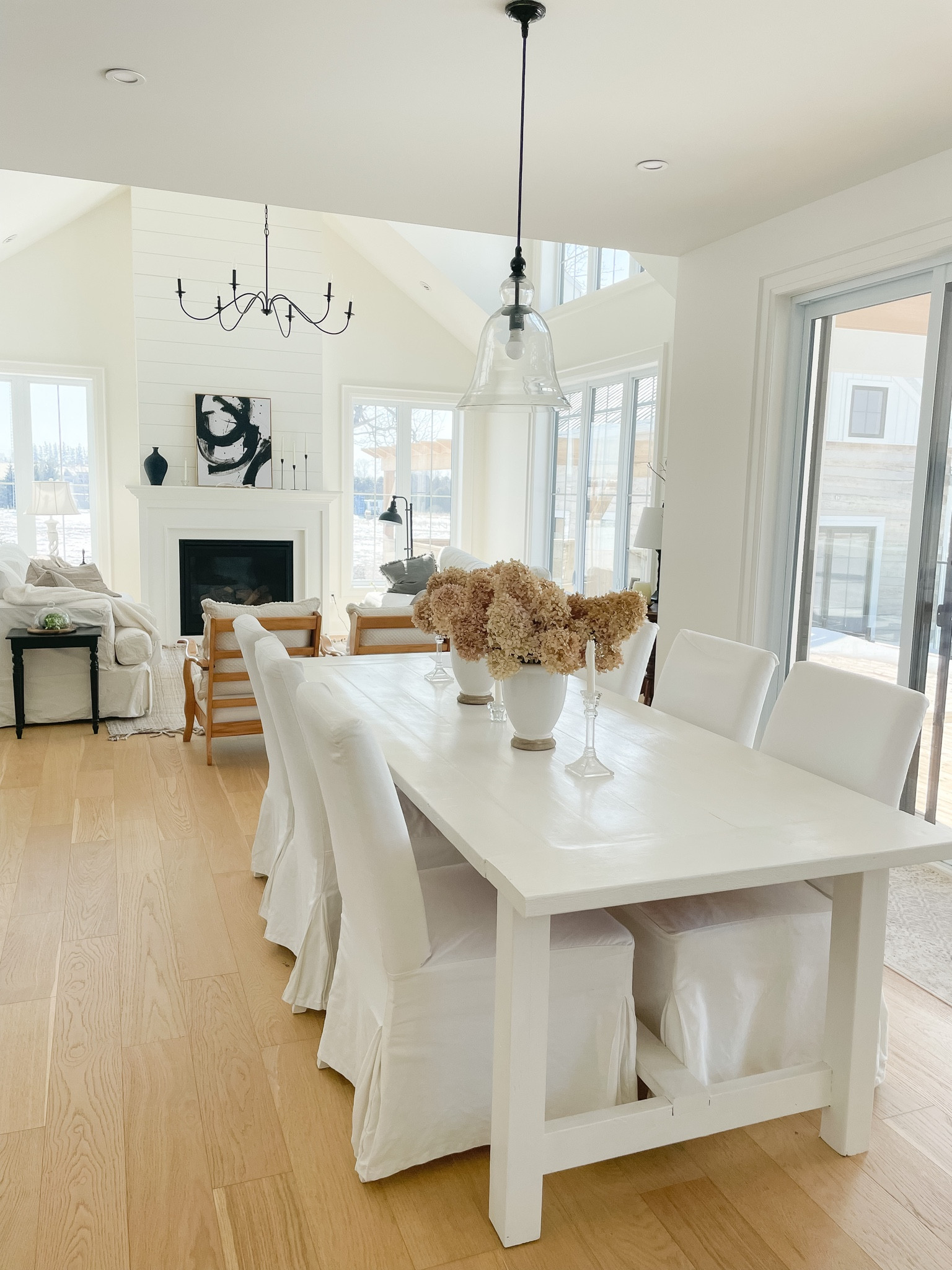 FARMHOUSE OPEN CONCEPT 
.
Simple white interior options 
- slipcover sofas
- slipcover chairs 
- neutral rug 
- minimalist lights 

#LTKFind #LTKstyletip #LTKhome